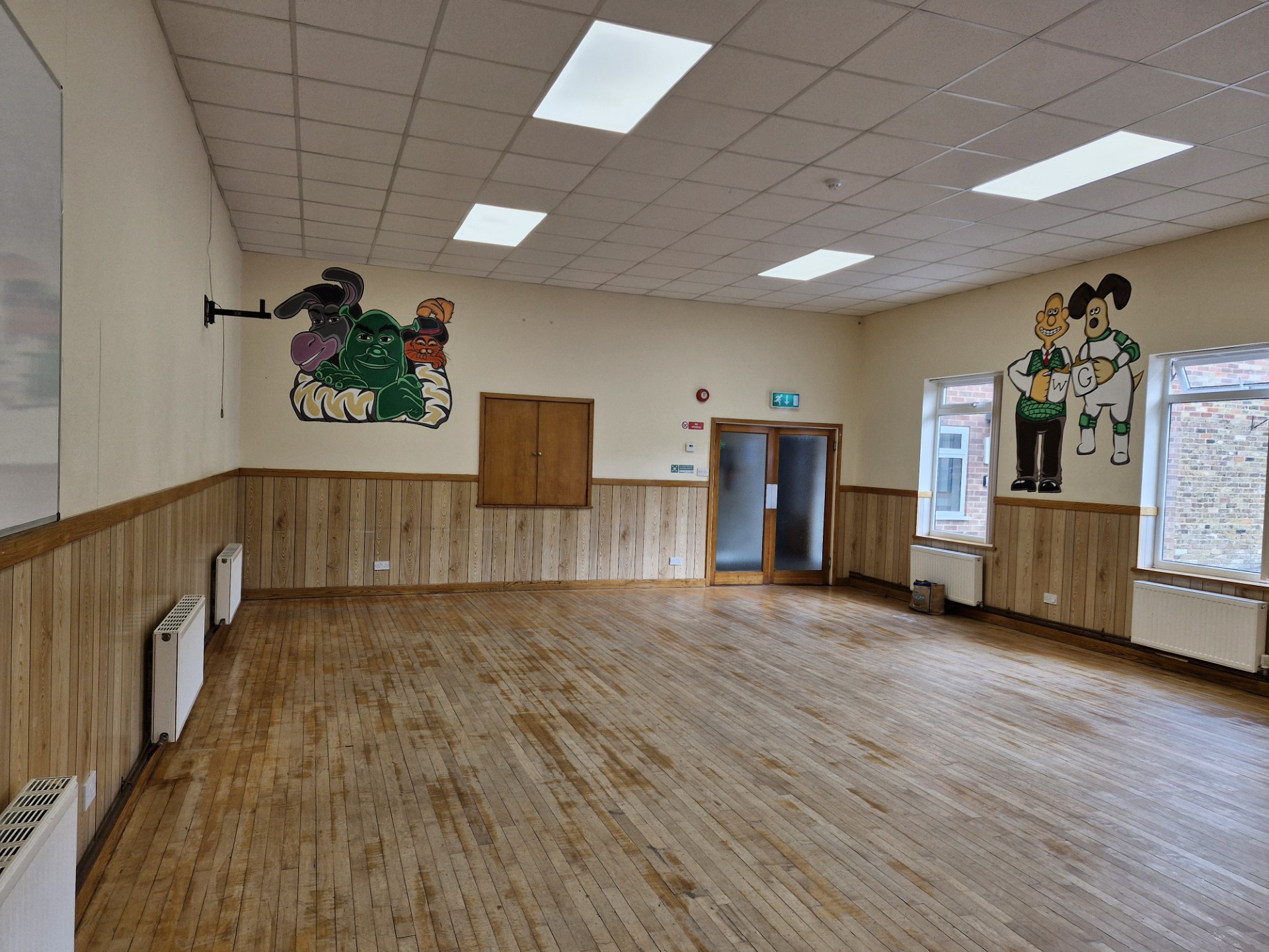 Large open hall at The Horizon Centre with wooden flooring and natural light