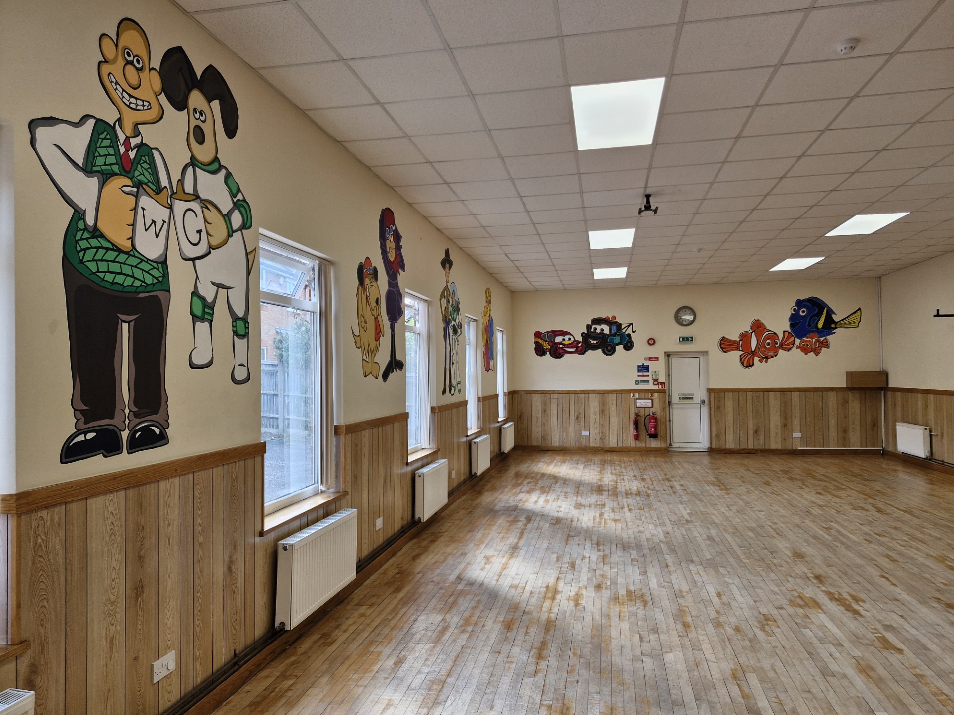 Wide view of The Horizon Centre main hall with wooden flooring and open space